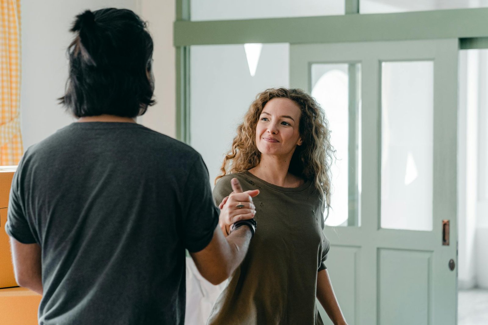 Property manager greeting a homeowner during rental appraisal meeting – Yello House Property Services