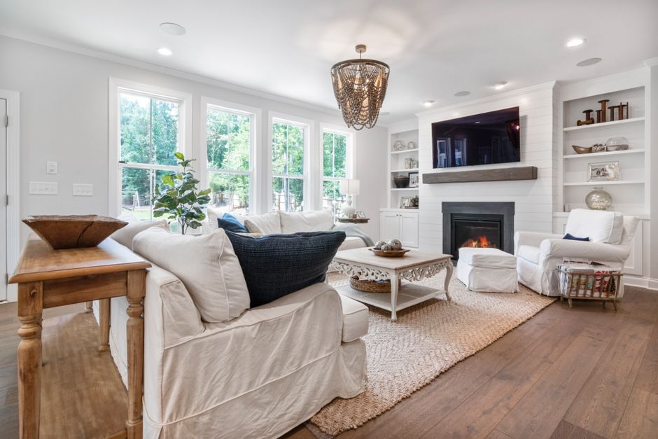 Warm lounge of a stand-alone home heated by a fixed fire, healthy homes standards heating